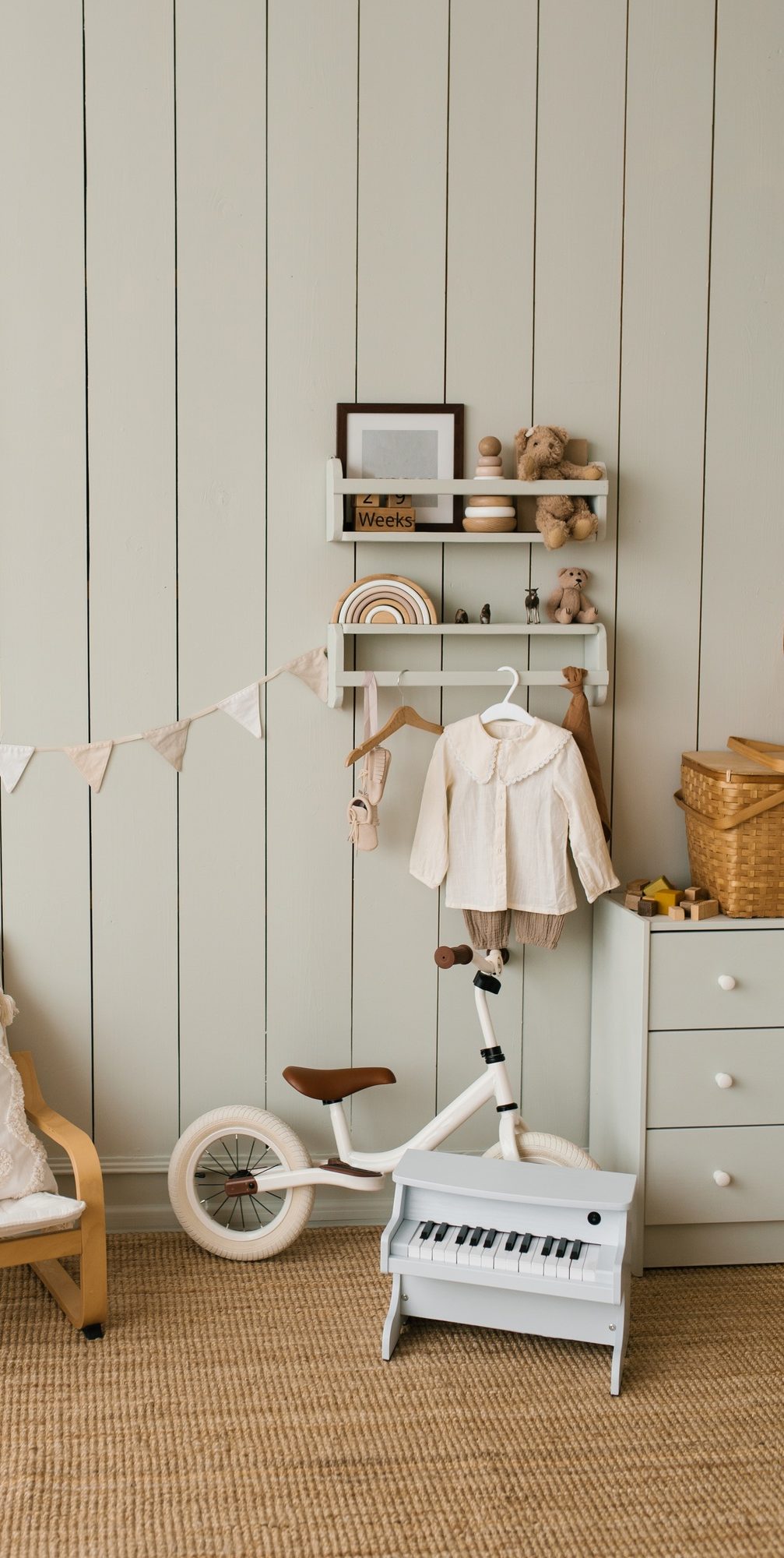 Stylish Composition of Cozy Scandinavian Interior of Children's Room with an Armchair